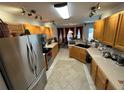 Spacious kitchen featuring stainless steel appliances and ample cabinetry at 9730 Sw 90Th St, Ocala, FL 34481