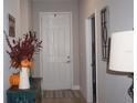 Bright and spacious entryway with light flooring and tasteful decor at 13091 Sw 77Th Ct, Ocala, FL 34473