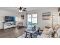 Bright living room with sliding doors leading to a patio at 6620 Sw 81St Loop, Ocala, FL 34476
