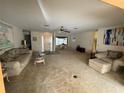 Open living room and dining area with ample space at 8120 Nw 47Th Ln, Ocala, FL 34482
