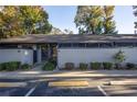 Condo building exterior showcasing entrance and landscaping at 3031 Se 5Th Ter # C, Ocala, FL 34471