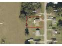 Property lot aerial view showing location and surrounding houses at 5500 Ne 11Th Ave, Ocala, FL 34479
