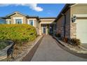Welcoming entryway with a paved walkway and lush landscaping at 9146 Sw 65Th Loop, Ocala, FL 34481