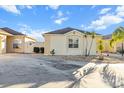 Single-story home with attached garage and landscaped front yard at 1106 Liendo Ln, The Villages, FL 32162