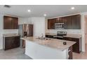 Modern kitchen featuring stainless steel appliances and granite countertops at 3649 Sw 177Th Lane Rd, Ocala, FL 34473