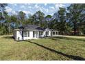 New construction home with spacious yard and carport at 12051 Sw 39Th Ln, Ocala, FL 34481