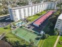 Oceanfront property featuring a tennis court and pool at 100 Silver Beach Ave # 304, Daytona Beach, FL 32118