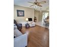 Living room featuring hardwood floors and comfortable seating at 8202 Sw 108Th Place Rd, Ocala, FL 34481