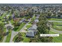 An aerial view highlights the home's location within the community, complete with a convenient driveway at 8342 Sw 65Th Ave, Ocala, FL 34476