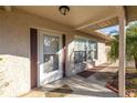 Front entrance with covered porch and brick walkway at 17451 Se 18Th St, Silver Springs, FL 34488