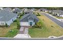 An aerial view showcases this two-story home nestled in a quiet neighborhood at 3810 Se 4Th Ter, Ocala, FL 34480