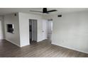 Open living area with wood-look floors and updated finishes at 1570 Se 27Th St # H, Ocala, FL 34471