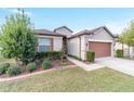 One-story house with attached garage and lush landscaping at 6622 Sw 97Th Terrace Rd, Ocala, FL 34481