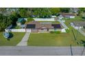 Aerial view of house, yard, and surrounding neighborhood at 6931 Se 54Th St, Ocala, FL 34472