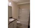 Clean bathroom with tub/shower combo, vanity, and tile floors at 5489 Nw 12Th. St, Ocala, FL 34482
