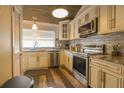 Updated kitchen with granite counters and stainless steel appliances at 11001 Se Sunset Harbor Rd # B10, Summerfield, FL 34491