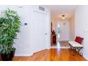 Bright entryway with hardwood floors and decorative elements at 15402 Sw 15Th Terrace Rd, Ocala, FL 34473