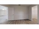Spacious bedroom with ample closet space and vinyl plank flooring at 178 Pine Crse, Ocala, FL 34472