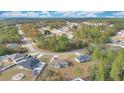 Aerial view showcasing the house's location in a neighborhood at 3648 Sw 131St Place Rd, Ocala, FL 34473