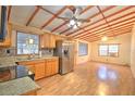 Bright kitchen with stainless steel appliances and wood cabinets at 10655 Ne 224Th Place Rd, Fort Mc Coy, FL 32134