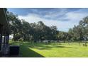 Cattle grazing in fenced pasture at 4880 Bannon Island Rd, Haines City, FL 33844