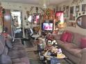 Spacious living room with plenty of seating and decor at 323 Dorsett Ave, Lake Wales, FL 33853
