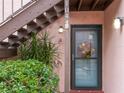 Condo entrance with a wreath and lush green plants at 104 La Casa # 104, Lake Wales, FL 33898