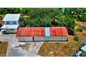 Aerial view of property showing main house and outbuildings at 638 W Main St, Haines City, FL 33844