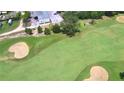 Aerial view of a golf course at 1608 Forest Hills Ln, Haines City, FL 33844