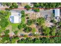 Property boasts a house, detached garage, and large lot at 12510 Lake Hatchineha Rd, Haines City, FL 33844