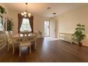 Bright dining room with hardwood floors at 3093 Dunmore Dr, Lake Wales, FL 33859