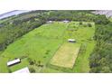 Aerial view of property highlighting the large lot size at 1955 W Lake Hamilton Dr, Winter Haven, FL 33881