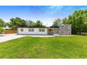 Newly renovated mid-century modern home with stone facade at 1004 Avenue G Ne, Winter Haven, FL 33881