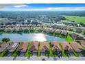 Community with lakefront homes and lush landscaping at 2505 Salzburg Loop, Winter Haven, FL 33884