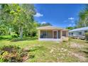 One-story house with a yard and screened porch at 317 C St, Lake Wales, FL 33853