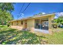 Back of the house showing a screened porch at 317 C St, Lake Wales, FL 33853