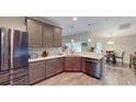 Spacious kitchen with stainless steel appliances and ample counter space at 1067 Snively Cir, Lake Hamilton, FL 33851