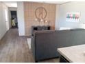 Spacious living room with wood-look floors at 1815 Christy Ln, Lakeland, FL 33801
