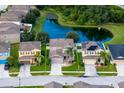 House nestled in a community near a pond at 3540 Julius Estates Blvd, Winter Haven, FL 33881