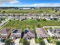 Neighborhood overview featuring several homes with solar panels at 278 Alford Dr, Davenport, FL 33896