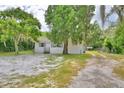 White single story house with a large yard at 4590 San Heath Rd, Bartow, FL 33830