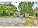 White single story house with a large yard at 4590 San Heath Rd, Bartow, FL 33830