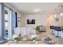 Bright dining area with seating for six and view of backyard at 343 Lake Smart Cir, Winter Haven, FL 33881