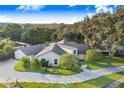 Aerial view of a single-Gathering home on a corner lot at 34415 Kingfish St, Fruitland Park, FL 34731