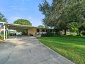 Ranch home with carport and lake view at 126 Bermuda Ct, Winter Haven, FL 33880