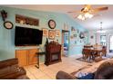 Spacious living area with a fireplace and comfortable seating at 1937 Rifle Range Rd, Winter Haven, FL 33880