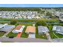 Aerial view of manufactured home community with canal view at 6762 Brentwood Ne Dr, Winter Haven, FL 33881