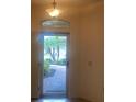 View of the entryway and patio doors at 1561 Vienna Square Dr, Winter Haven, FL 33884