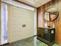 Entryway with double doors and a dark wood console table at 18 Coventry Dr, Haines City, FL 33844