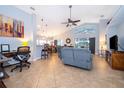 Open living area with tile floors and vaulted ceilings at 2060 Hemingway Ave, Haines City, FL 33844